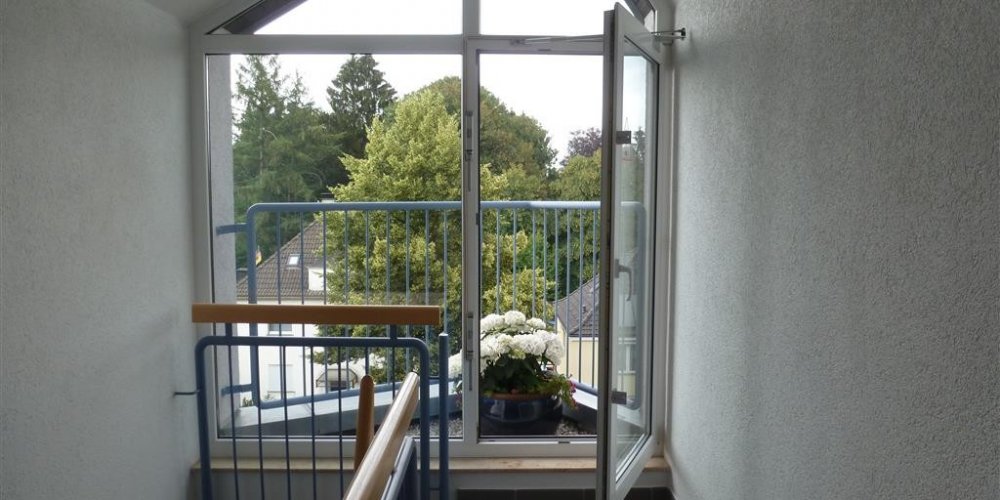 VERKAUFT - Maisonettewohnung mit kleiner Sonnenloggia, 2 Bädern & Tiefgaragenstellplatz 