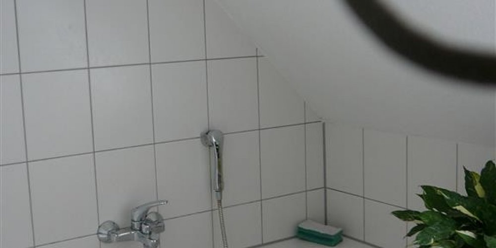 VERKAUFT - Maisonettewohnung mit kleiner Sonnenloggia, 2 Bädern & Tiefgaragenstellplatz 